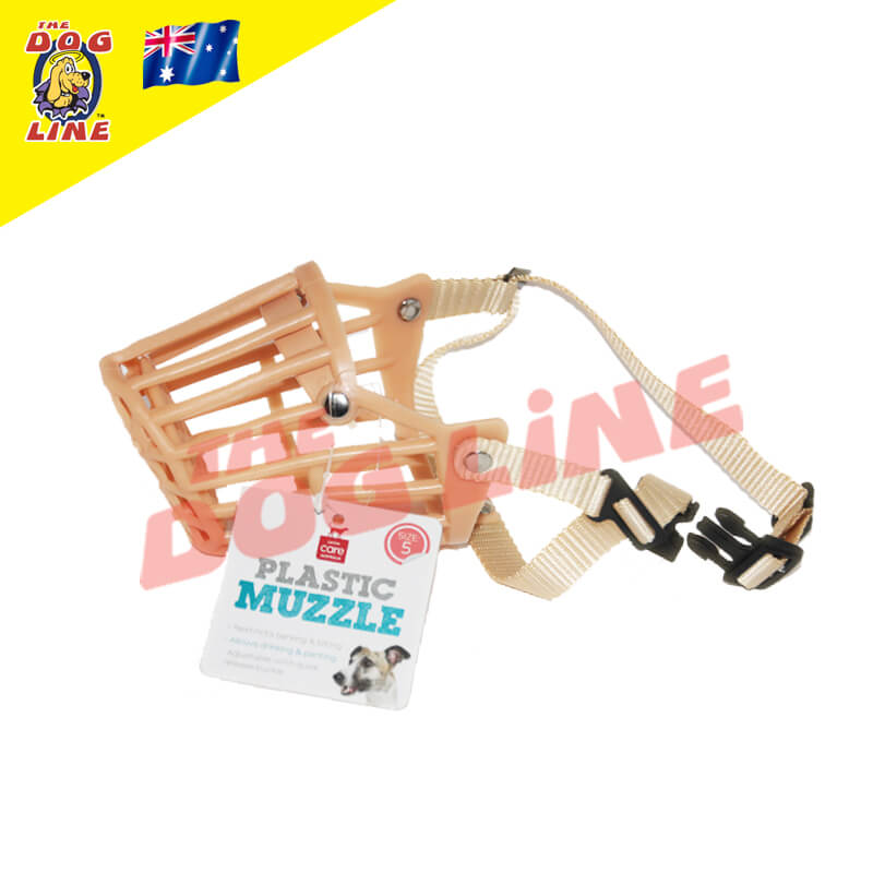  beige plastic cage dog muzzle with a matching beige strap and a black tri-clip buckle, designed to prevent biting while ensuring comfort. The attached item tag displays the product title: 'Plastic Muzzle.' In the upper left, a yellow right-angle flag features The Dog Line logo and the Australian flag, signifying that the product is proudly made in Australia.