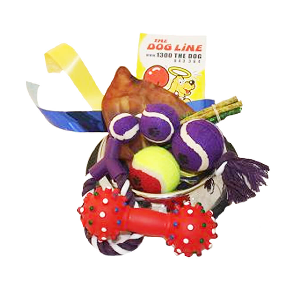 Gift hamper from The Dog Line featuring a variety of dog toys including chew toys, pig ears, balls, and more. Perfect for spoiling your dog with a selection of fun and engaging toys for playtime and chewing satisfaction